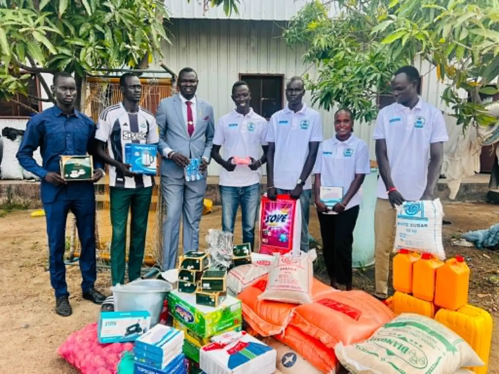 Twic Students’ Association leadership hands over donated items to students at the University of Juba hostel. (Image Credit: Mohammed Makuch Malekdit/Twic Media Reports)
